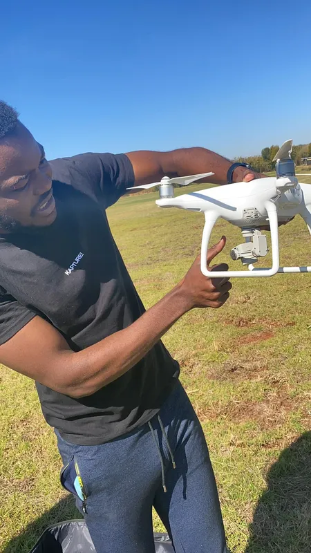 A Kapture pilot launching a drone