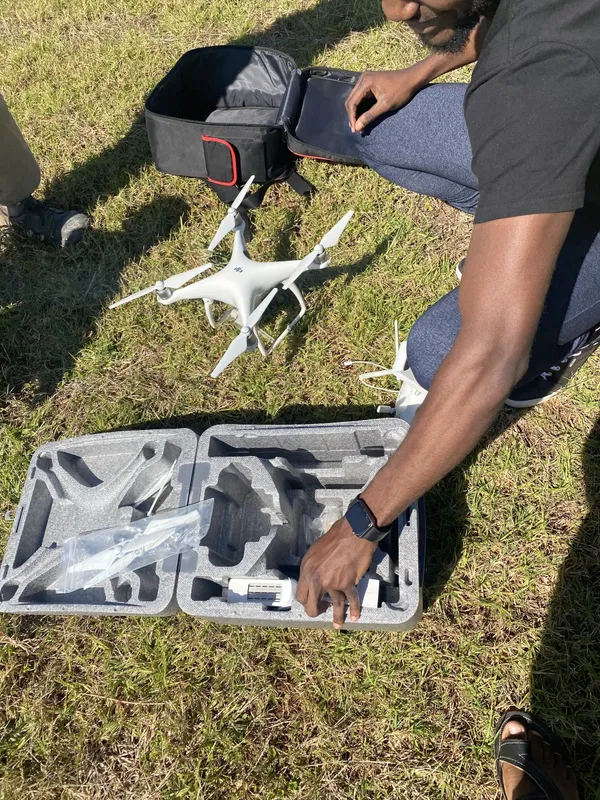 Kapture crew setting up a drone
